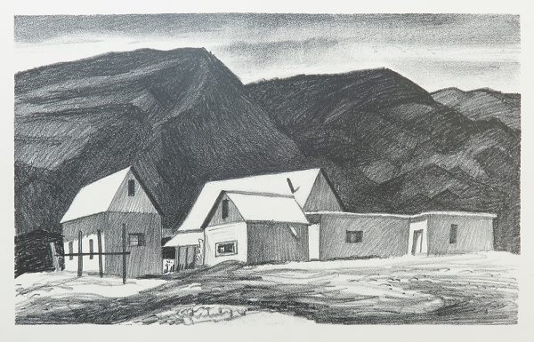 Farm house and small buildings are in front of tow dark mountain peaks.