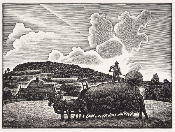 A wagon filled with hay is standing with three horses, one man tosses hay to another man on top of the wagon. A farm house is to the left and clouds and sun rays fill the sky.