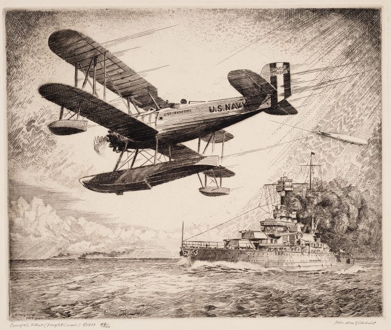 A Vought Corsair airplane is flying past a ship on the ocean that is spewing dark smoke into the air. A blimp can be sen above the war ship.