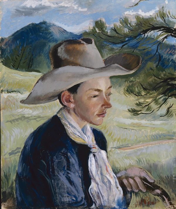 Portrait of a young man wears a cowboy hat and is holding reins in his left hand. There is a landscape behind him of a pine tree on the right and a mountain on the left.