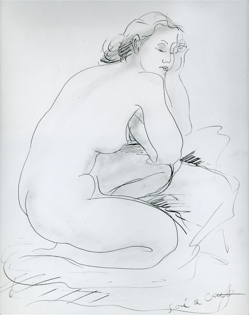 A nude female is seen from the side. She rests on bent legs.
