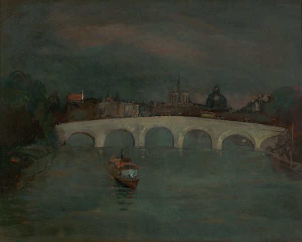 A view of the Seine with a boat in front of a  bridge and buildings in the background.