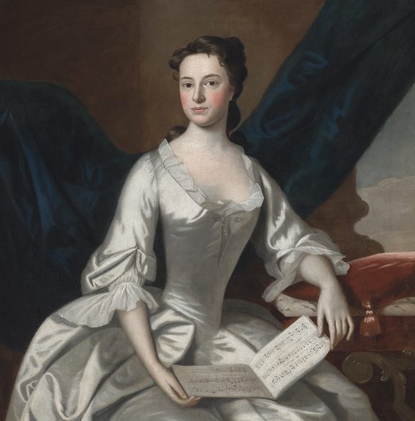 A portrait of a woman in a white dress holding a music book on her lap.