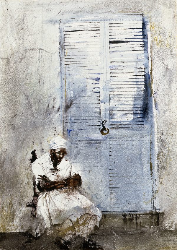 A woman in a white dress and kerchief sits in front of a door with slats.
