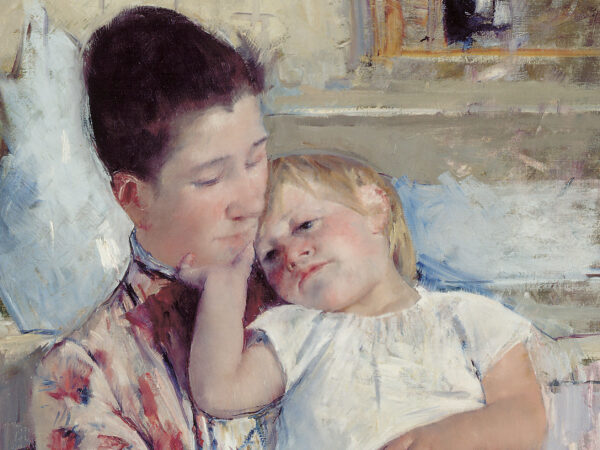 A woman in a flowered dress holds a child. There is a blue vase and washbasin behind them in this painting by Mary Cassatt