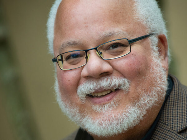 Photo of a man smiling at the camera