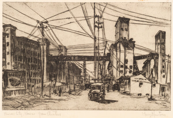 A cityscape of brick building on the left, grain elevators on the right and a car at center. Cable car and telephone wires fill the sky.