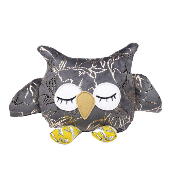 Stuffed toy owl in a gray fabric with gold and silver threads. The owl's eyes are closed, the beak is orange felt, and his feet are yellow with silver threads.