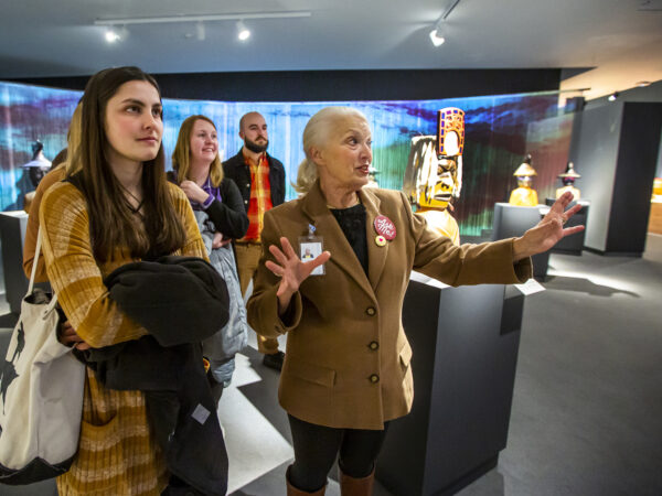 Group of people in the gallery with a docent guide