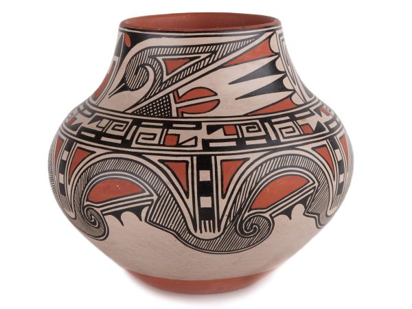 Pottery vessel with a Native American pattern in oranges, ivory and black