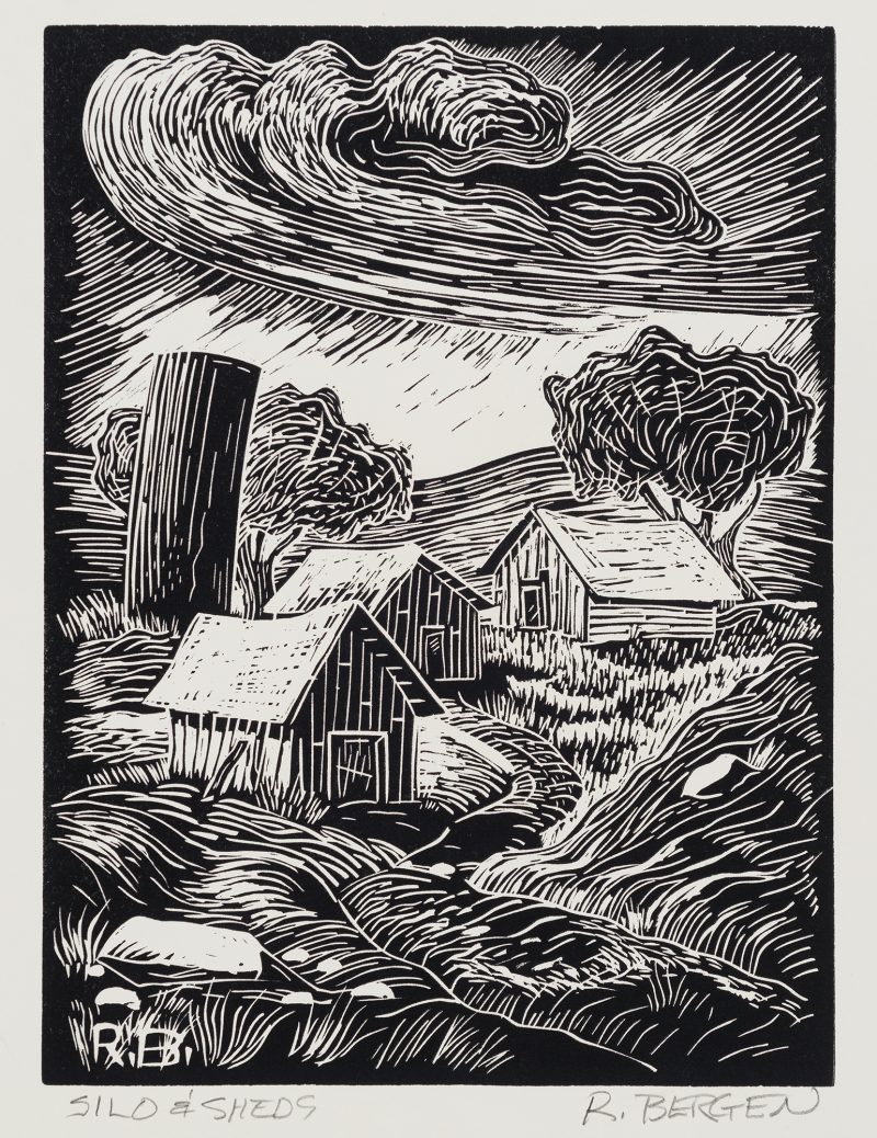 Black and white print of a silo, shed and two additional farm buildings situated on rolling hills with two trees and a swirling clouded sky.