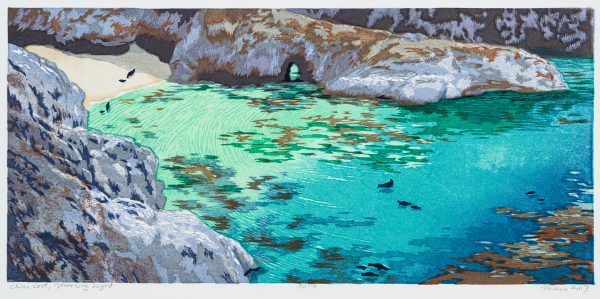 Color print of a rocky cove with blue green water and distant seals swimming and on beach.