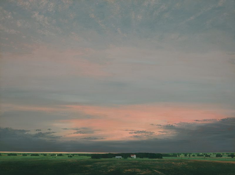 Plains skyline with low horizon with two building structures in center middle ground. The sky is of blue-grays, pinks, gray clouds, and green farm lands or fields.