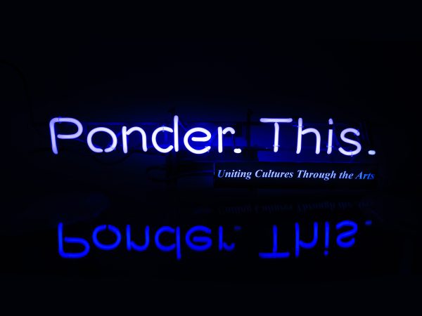 The words Ponder This twice in two shades of purple on a black background