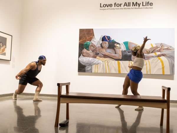 Dancers perform in a gallery